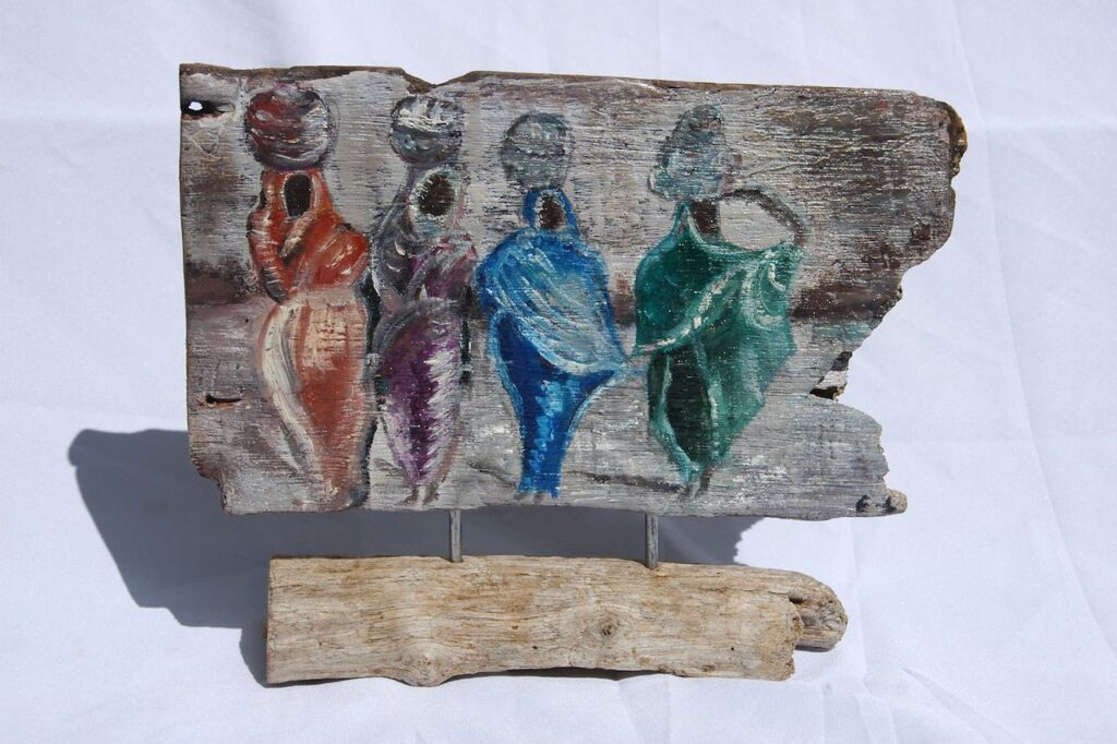 Tableau en peinture acrylique sur bois représentant un paysage abstrait avec des couleurs vives et des textures en relief